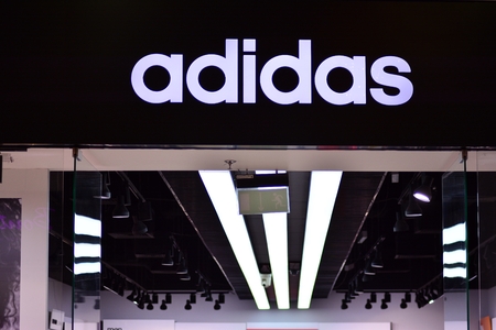 Szczecin, Poland. 23 December 2018. Sign Adidas. Company signboard Adidas.のeditorial素材