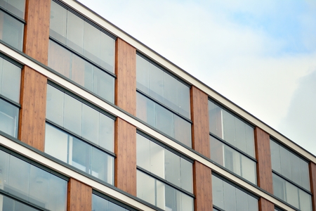 Abstract fragment of contemporary architecture, walls made of glass and concrete.