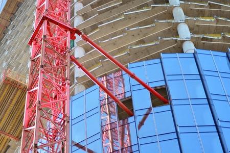 Crane attached to buildingの写真素材