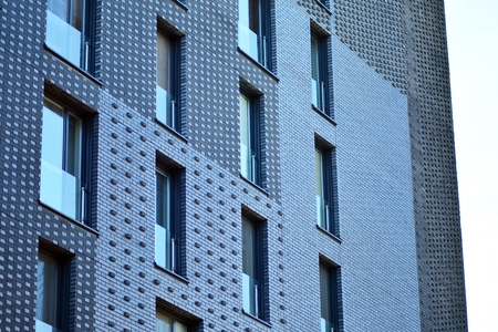 Futuristic architecture of apartment building. Modern residential architecture