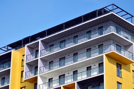 Futuristic architecture of apartment building. Modern residential architecture