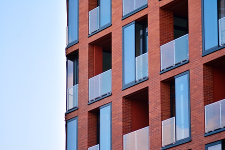 Modern condo building with huge windowsの写真素材