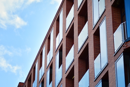 Modern condo building with huge windows