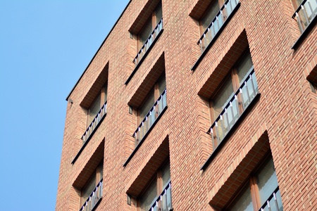 European modern residential architecture. Fragment of a modern apartment building in front. Very...