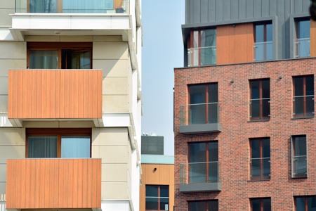 European modern residential architecture. Fragment of a modern apartment building in front. Very...