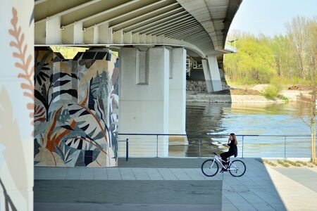 Warsaw, Poland. 17 April 2019. Vistulan Boulevards on the western side of the Vistula River in Warsaw. The promenade at the bank of the Vistula riverのeditorial素材