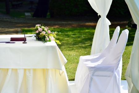 Wedding ceremony in a beautiful gardenの写真素材