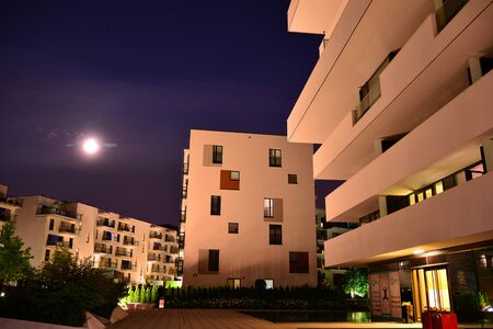 Warsaw, Poland. 12 July 2019. "Artistic Zoliborz". Modern apartment buildings at night.のeditorial素材