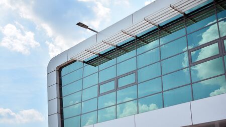 The windows of a modern building for offices. Business buildings architecture.