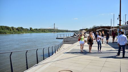 Warsaw, Poland. 24 August 2019. Vistulan Boulevards on the western side of the River Vistula in Warsaw. The promenade at the bank of the Vistula riverのeditorial素材