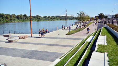 Warsaw, Poland. 24 August 2019. Vistulan Boulevards on the western side of the River Vistula in Warsaw. The promenade at the bank of the Vistula riverのeditorial素材