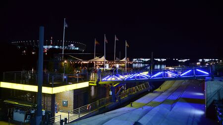 Warsaw, Poland. 25 August 2019. Vistulan Boulevards on the western side of the River Vistula in Warsaw in night. The promenade at the bank of the Vistula river in night.のeditorial素材