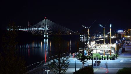 Warsaw, Poland. 25 August 2019. Vistulan Boulevards on the western side of the River Vistula in Warsaw in night. The promenade at the bank of the Vistula river in night.のeditorial素材