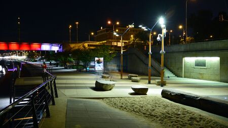 Warsaw, Poland. 25 August 2019. Vistulan Boulevards on the western side of the River Vistula in Warsaw in night. The promenade at the bank of the Vistula river in night.のeditorial素材