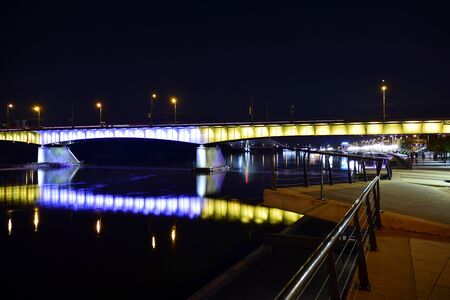 Warsaw, Poland. 25 August 2019. Vistulan Boulevards on the western side of the River Vistula in Warsaw in night. The promenade at the bank of the Vistula river in night.のeditorial素材