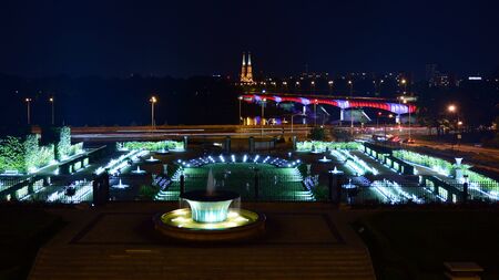 Warsaw, Poland. 26 August 2019. Castle Gardens - a garden adjacent to the Royal Castle in Warsaw from the side of the Vistula in night. Today, the castle gardens are the perfect resting place.のeditorial素材