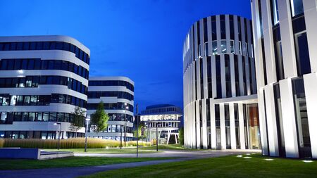 Warsaw, Poland. 28 August 2019. Business Garden complex in night. Seven independent buildings...