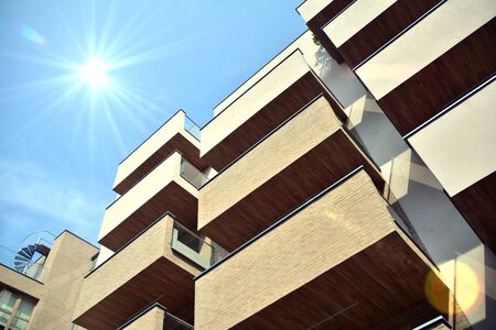Modern apartment buildings on a sunny day with a blue sky. Facade of a modern apartment...
