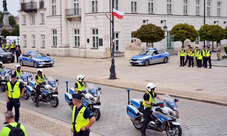 Warsaw, Poland. 2 September 2019. Cortege of a US delegation in Warsaw. The cars of the diplomats surrounded by policemen on police motorcycles.のeditorial素材