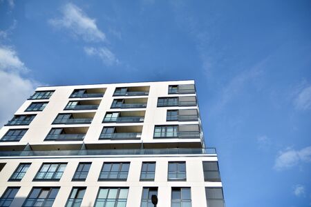 Modern and new apartment building. Multistoried modern, new and stylish living block of flats.
