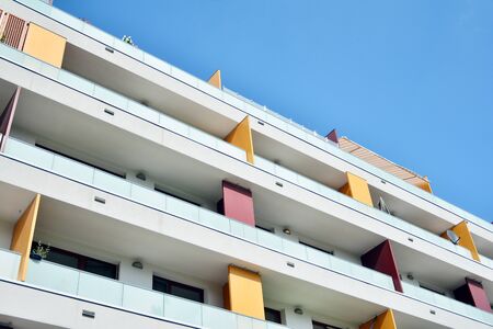 Modern apartment buildings on a sunny day with a blue sky. Facade of a modern apartment buildingの写真素材
