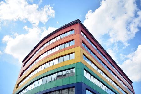 Facade fragment of a modern office building. Exterior of glass wall with abstract texture.の写真素材