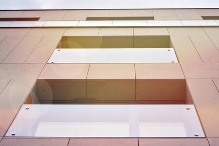 Modern apartment buildings on a sunny day with a blue sky. Facade of a modern apartment...