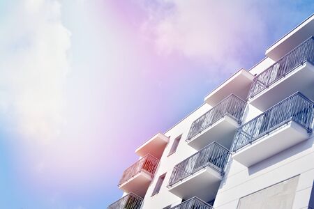 Modern apartment buildings on a sunny day with a blue sky. Facade of a modern apartment...