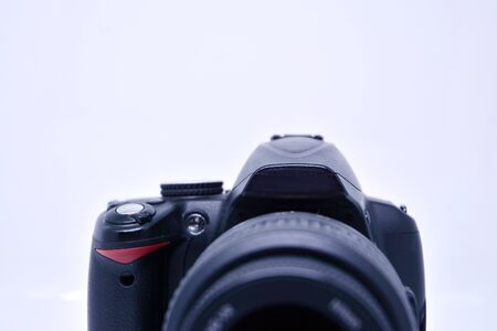Digital photo camera isolated on bright background