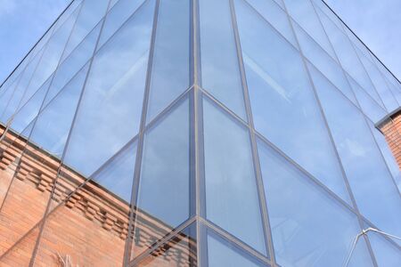 Modern office building detail, glass surface
