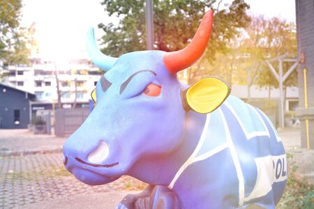 Warsaw, Poland. November 2, 2019. A sculpture depicting a blue cow. It is located next to the gallery at Duchnicka Street in Warsaw.のeditorial素材