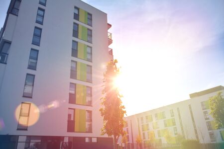 Modern apartment building exterior in sunny day