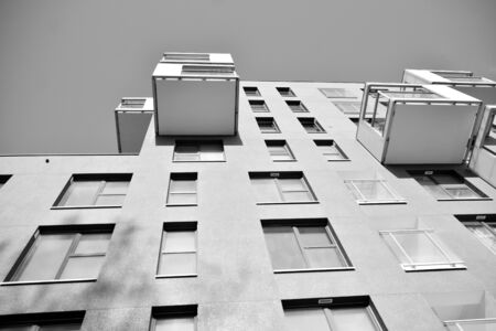 Contemporary apartment building. Generic residential architecture. Black and white.