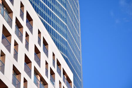 Fragment of modern residential apartment with flat buildings exterior. Detail of new luxury house and home complex.の写真素材