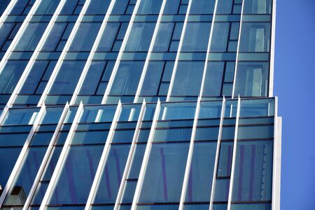 Abstract texture of blue glass modern building skyscrapers. Business background.