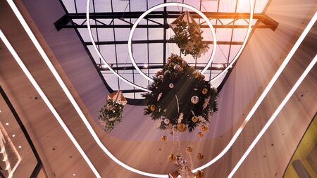 Sun shining though glass roof in shoping center. Abstract architecture fragment.の写真素材