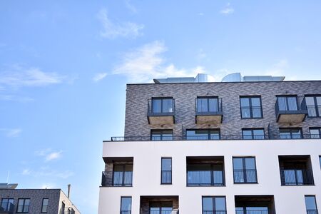 Modern and new apartment building. Multistoried, modern, new and stylish living block of flats.