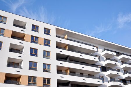 Modern and new apartment building. Multistoried, modern, new and stylish living block of flats.
