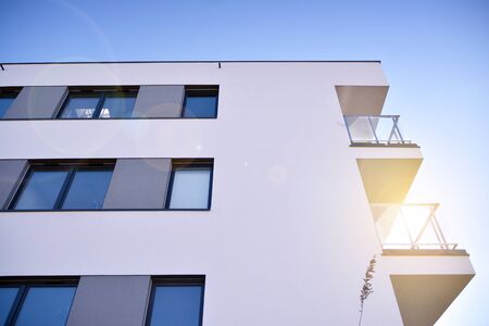 Multistory new modern apartment building with architectural details of modern architecture.