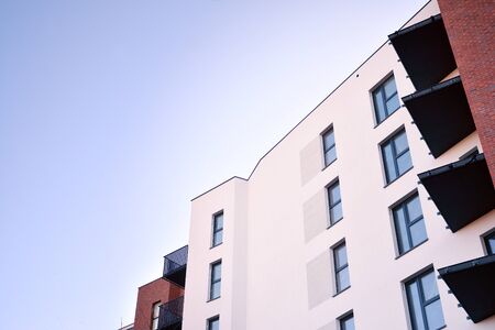 Multistory new modern apartment building with architectural details of modern architecture.
