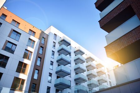Multistory new modern apartment building with architectural details of modern architecture.