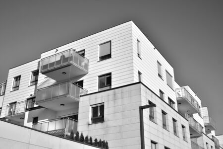 Detail of modern residential flat apartment building exterior. Fragment of new luxury house and home...