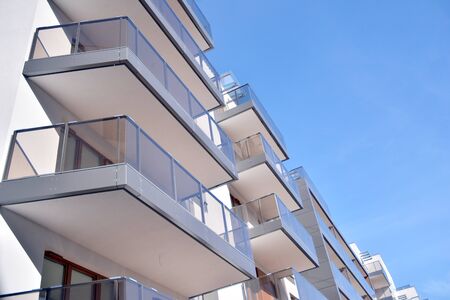 New building condominium. Modern apartment complex exterior.