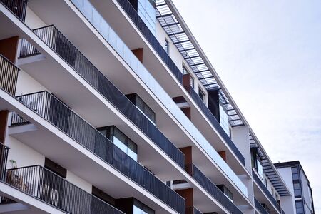 New building condominium. Modern apartment complex exterior.