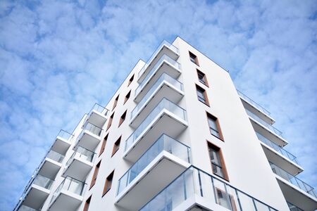 New building condominium. Modern apartment complex exterior.
