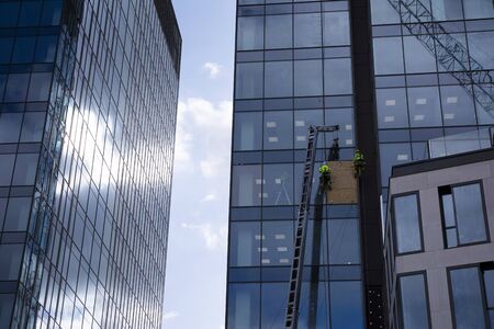 Modern office building on a clear sky background.