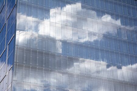 Modern office building on a clear sky background.