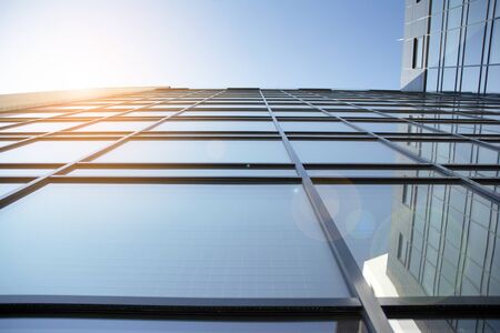 Abstract texture and blue glass facade in modern office building.