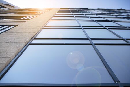 Abstract texture and blue glass facade in modern office building.