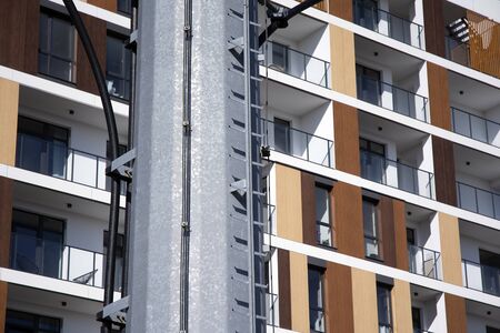 Modern apartment building flat estate concept. Outdoor residential facility at sunset and sunrise.